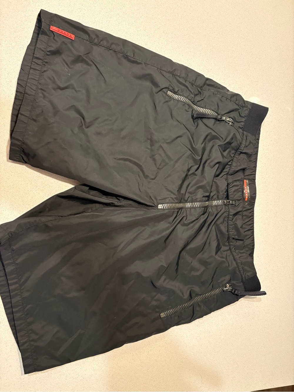 Prada Black Nylon Men's Hybrid Shorts with Red Logo Tabs